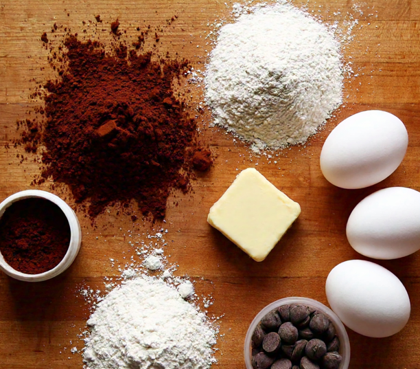 Ingredients for brookies laid out on a wooden surface.