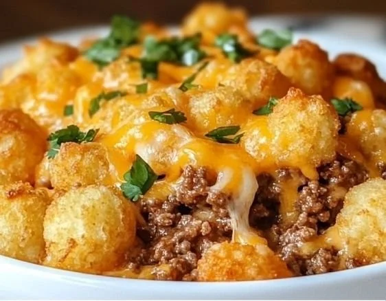 Delicious Tater Tot Casserole with Ground Beef topped with golden crispy tots