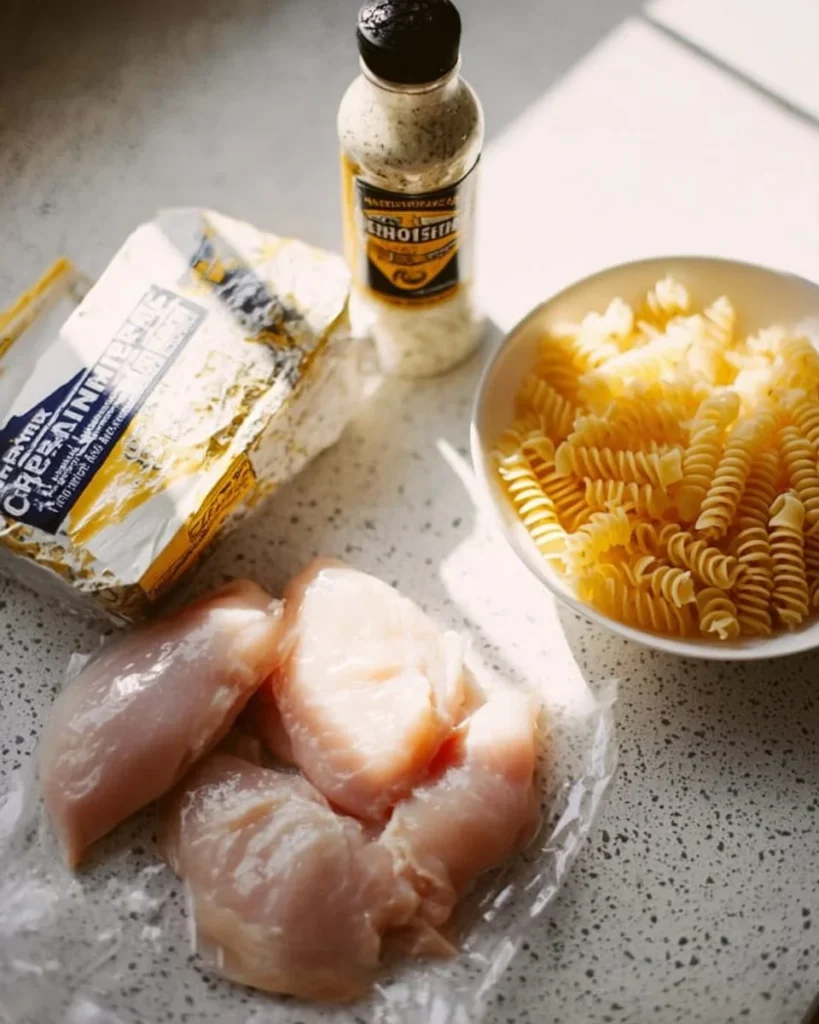 Delicious Garlic Parmesan Chicken Pasta topped with herbs and cheese