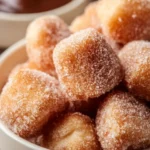 Delicious healthy air fryer churro bites sprinkled with cinnamon sugar.