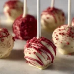 Delicious Red Velvet Cake Pops decorated with cream cheese frosting