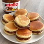 Nutella pancake sandwiches featuring fluffy mini pancakes filled with Nutella