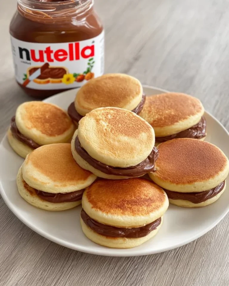 Fitwaffle | "NUTELLA PANCAKE SANDWICHES 😍 Soft and fluffy mini pancakes stuffed with a layer of Nutella… |