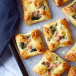 Savory ham and cheese puffs baked to golden perfection.