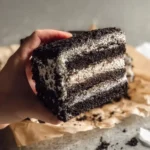 Homemade Oreo ice cream sandwiches with creamy filling and chocolate cookies.