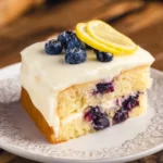 Delicious lemon blueberry cake with fresh berries and lemon zest