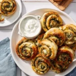Spinach Feta Pinwheels served on a platter