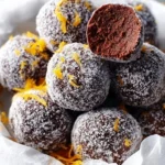 Delicious homemade chocolate orange truffles on a decorative plate