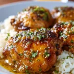 Delicious Crockpot Chicken Thighs served with creamy gravy