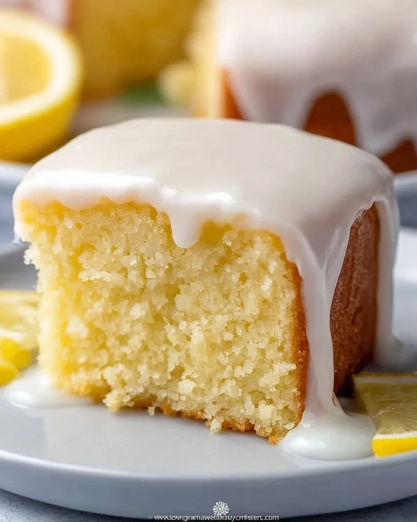Delicious lemonade cake topped with lemon glaze and fresh fruit