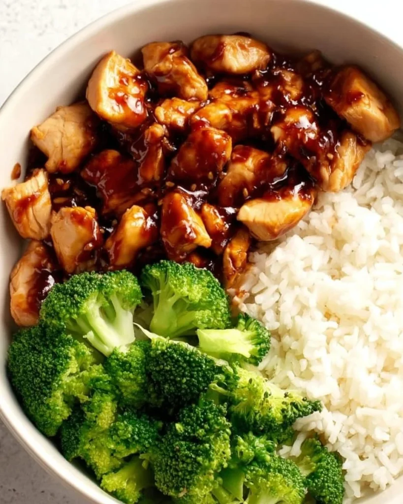 Delicious quick teriyaki chicken rice bowls with vegetables and sauce